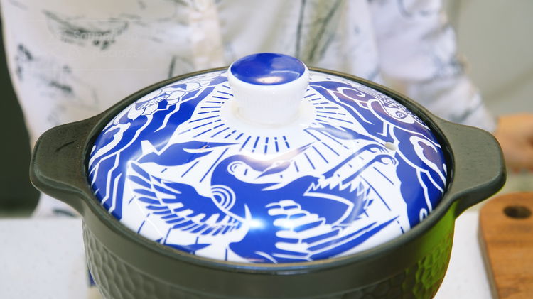 Image of Put on the lid. Switch the heat to low and...