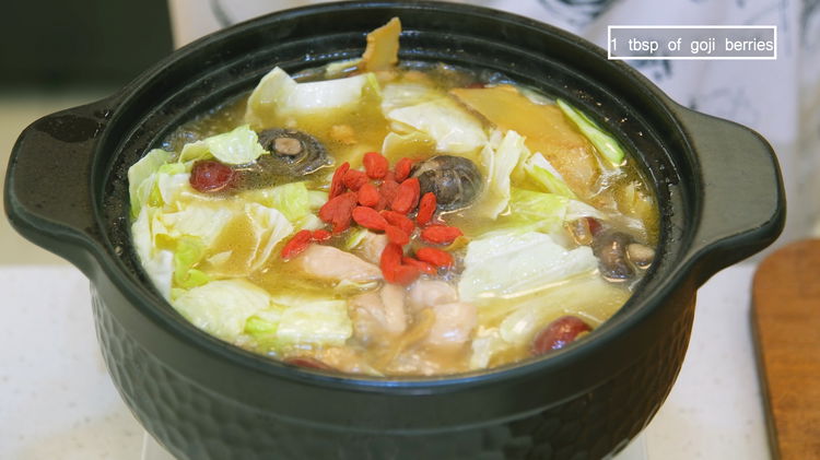 Image of Once the chicken soup is done, add the cabbage and...