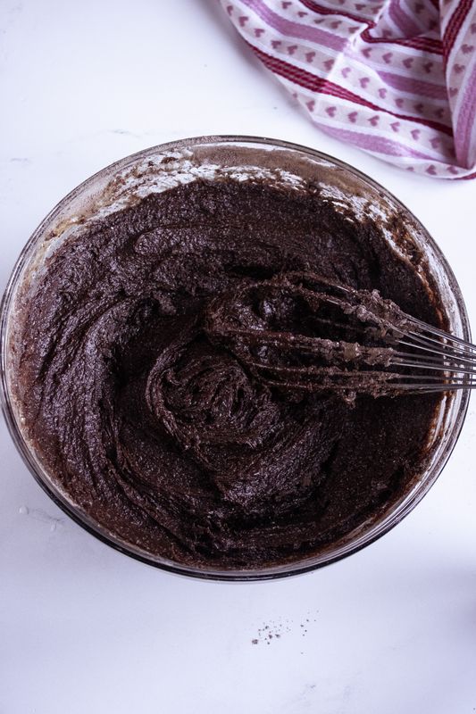 Image of Add in flour mixture to liquid mixture. 