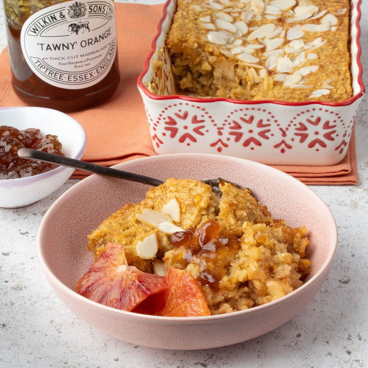 Image of Serve with sliced oranges on the side.