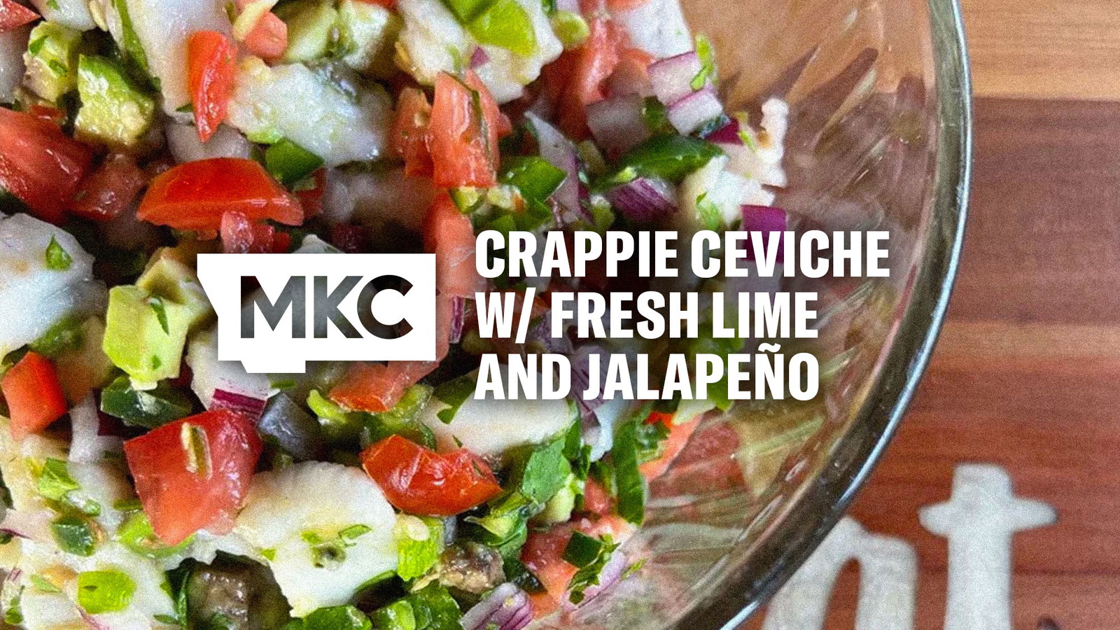 Crappie ceviche featuring lime‑marinated fish mixed with jalapeño, red onion, tomato, and avocado.