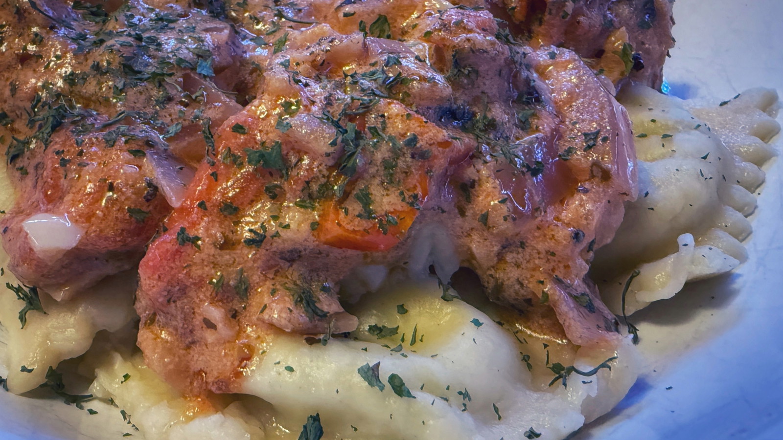 Three Cheese Scratch Made Raviolis in Creamy Garlic Tomato Sauce