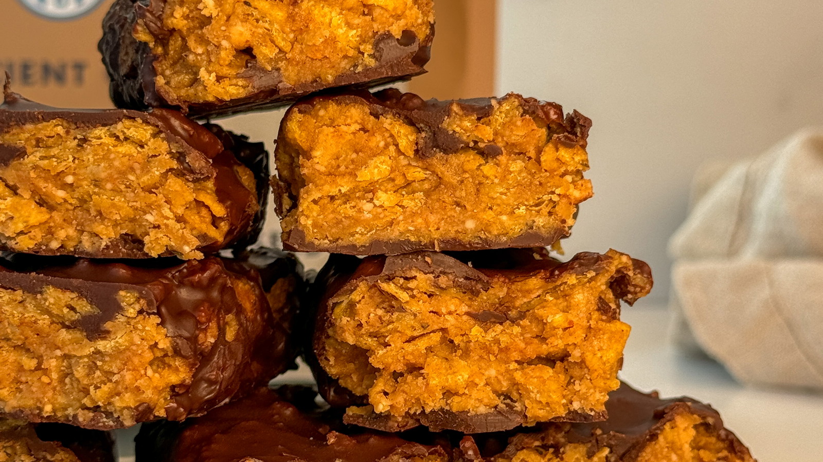 Healthy Butterfingers made with crushed MASA Churro chips, peanut butter, and dark chocolate for a seed oil-free treat.