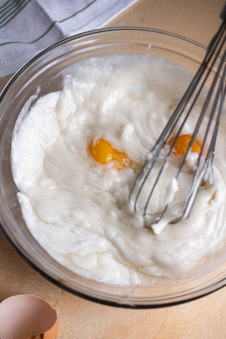 Image of Add egg and mix until combined.