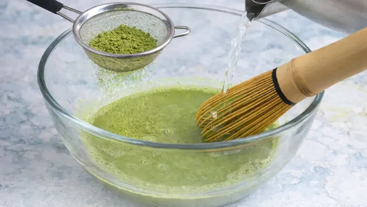 Image of Sift the matcha powder into a bowl to prevent clumps....