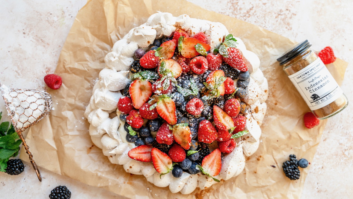 Cinnamon Pavlova with Berries and Maple Whipped Cream