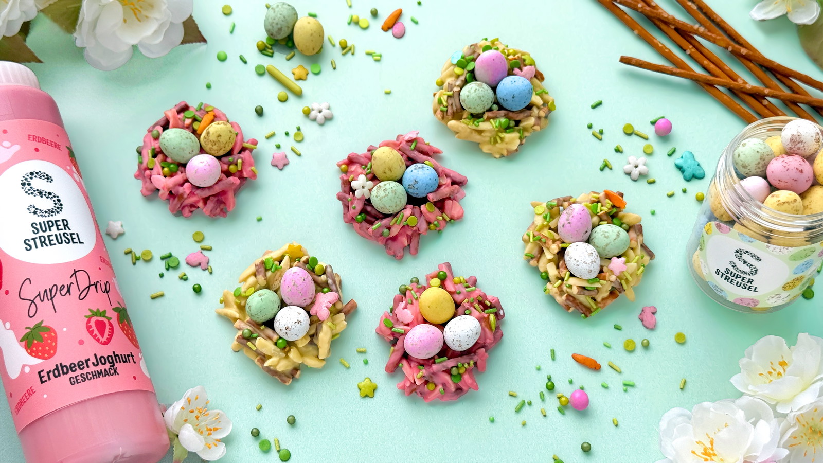 Mini Knusper Nester aus Salzstangen und Mandeln mit SuperDrip Erdbeer Joghurt, Zitrone, StreuselMix FrühlingsFlitzer und Schoko-Ostereiern.