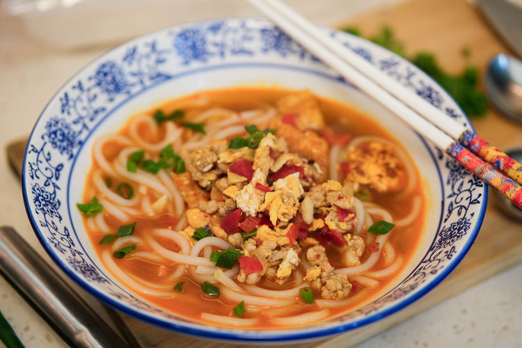 Image of Finish by sprinkling the green parts of the scallions on...