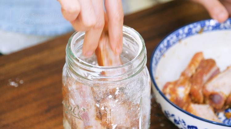 Image of Add the ribs to the jar, put on the lid,...
