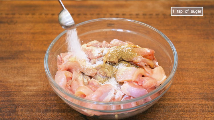 Image of Cut the boneless and skinless chicken thighs into bite-sized pieces....