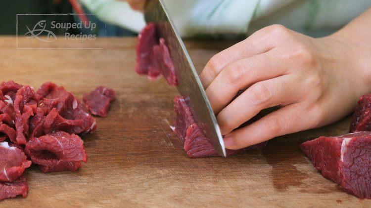 Image of Slice the beef thinly against the grain (perpendicular to the...