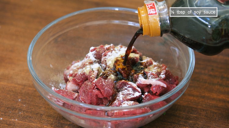 Image of Add the beef slices, white pepper powder, garlic powder, baking...