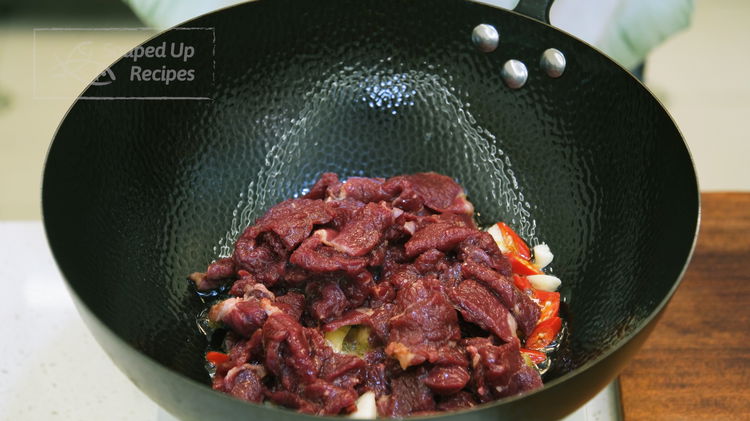 Image of Heat a wok over high heat until smoking hot. Add...