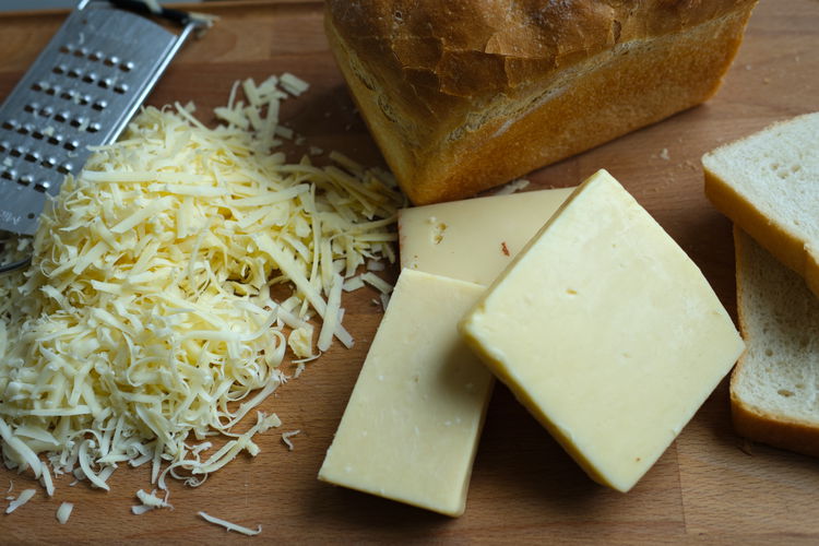 Image of grate cheese. Using a mix of cheese adds to the...