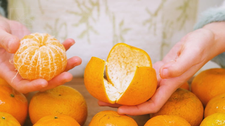 Image of Remove the fruit inside and repeat with the remaining tangerines....