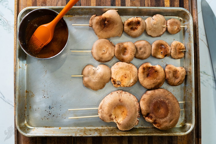 Image of Remove the stems and then take a skewer though the...