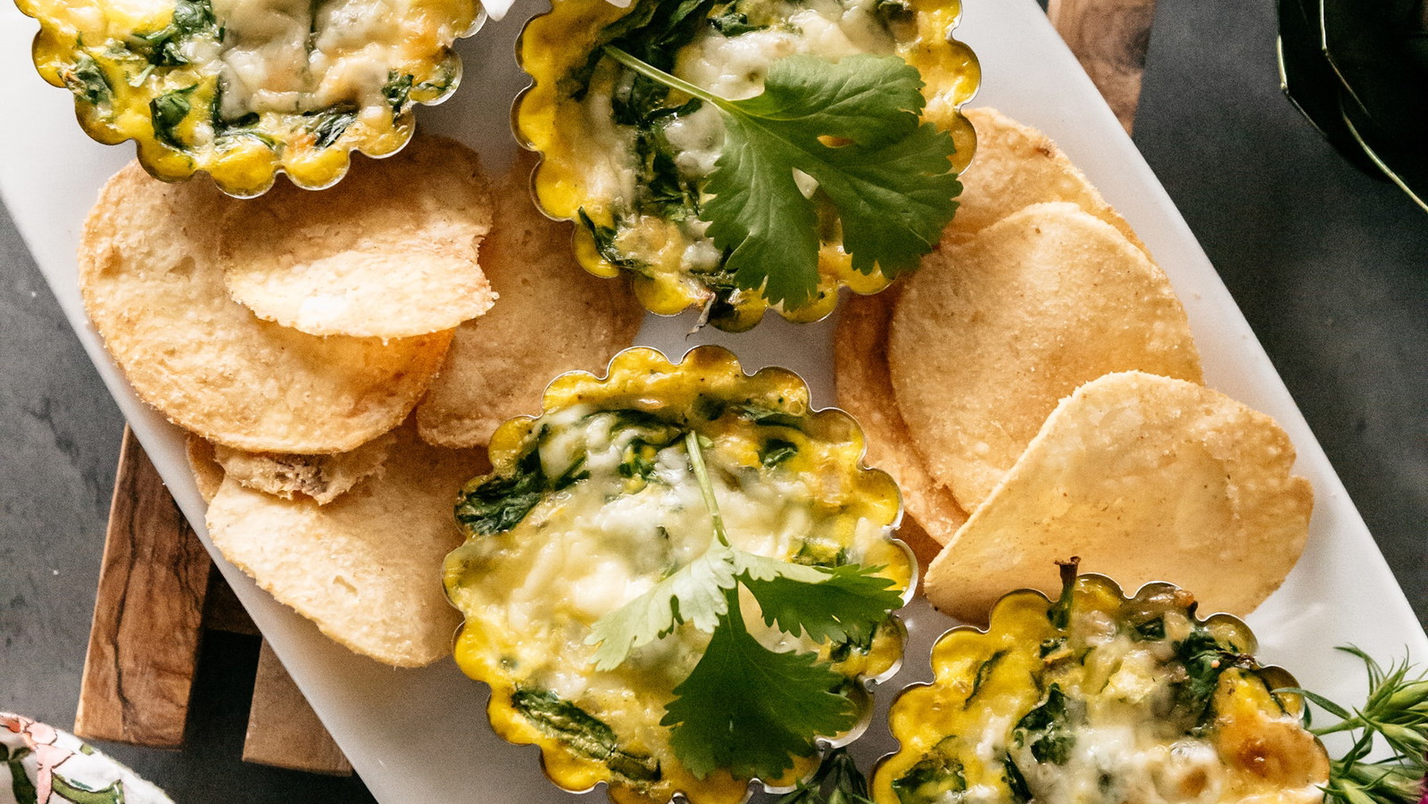 image of the potato chip-crusted quiches on an Easter-themed table spread