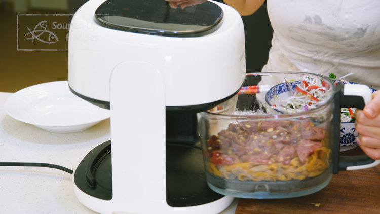 Image of Add one portion of noodles to the air fryer basket...