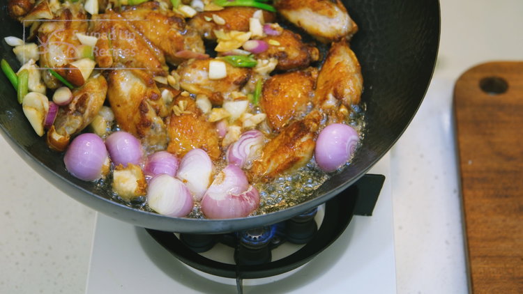 Image of Flip all the wings and add the reserved aromatics from...