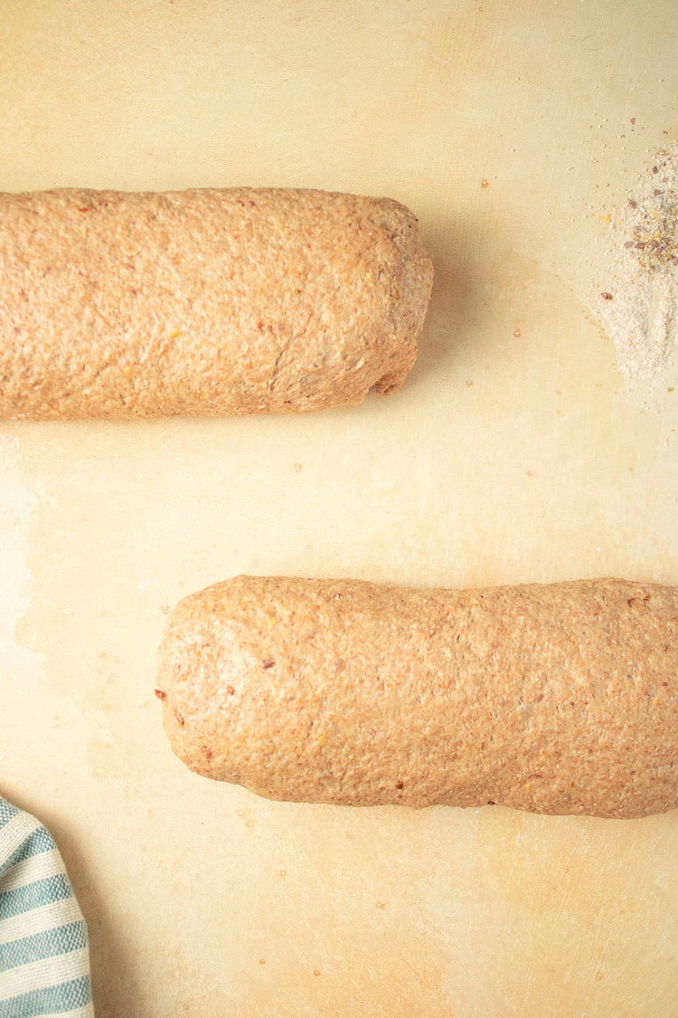 Image of Roll each piece into a log shape. Tuck the ends...