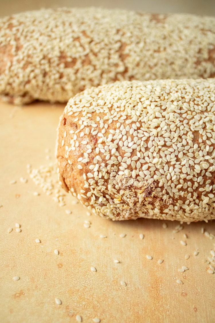 Image of Brush with water and sprinkle with extra seeds. Place in...