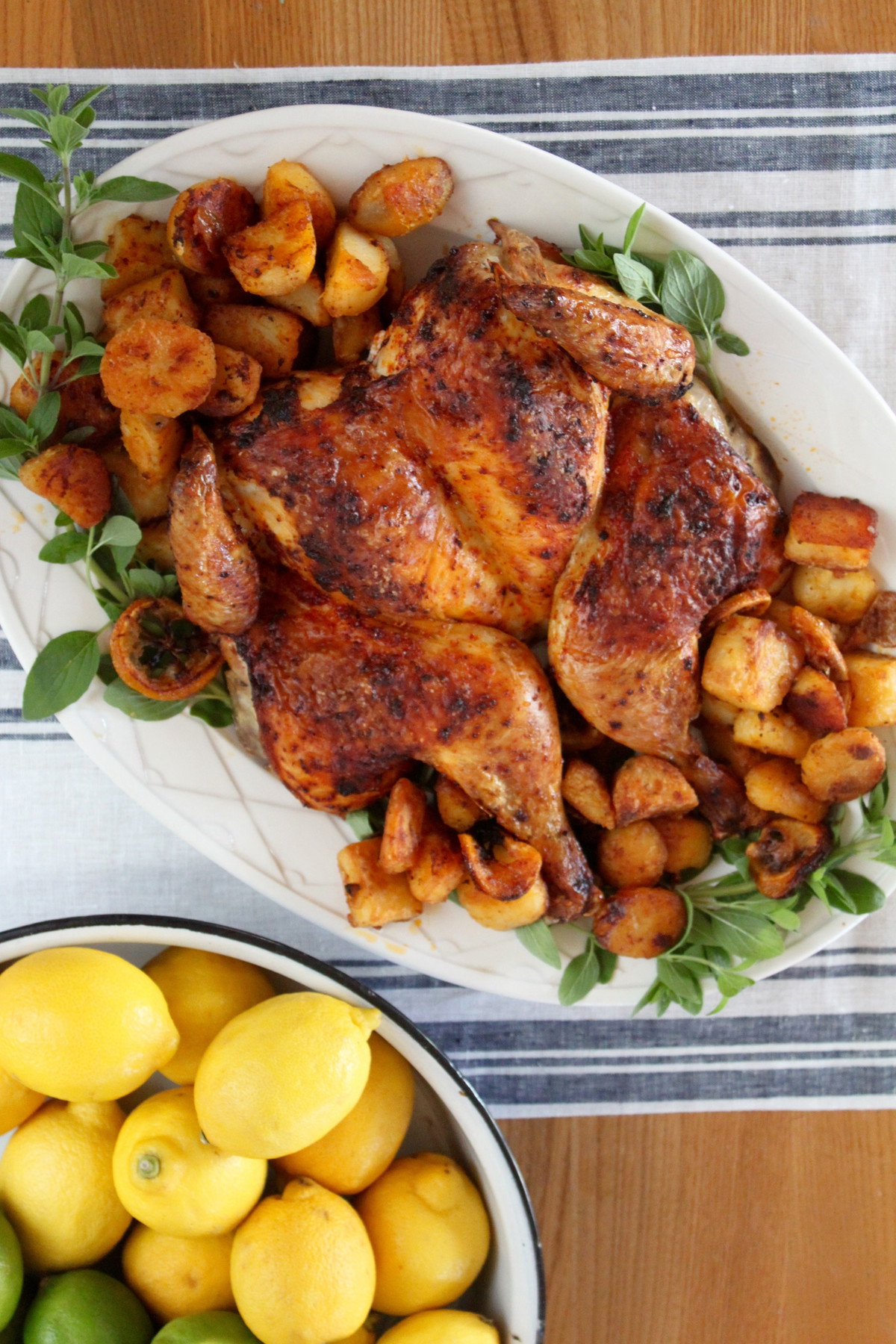 Spatchcocked Piment d’Ville Chicken with Charred Lemons and Potatoes