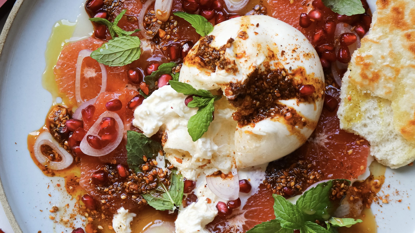 Image of Spicy Honey & Dukkah Burrata Plate With Piquant Dukkah Oil & Pomegranate