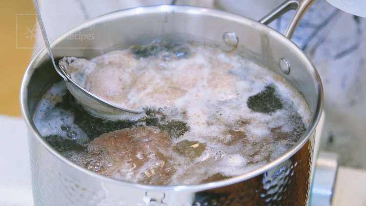 Image of Once boiling, skim off any scum using a fine sieve....