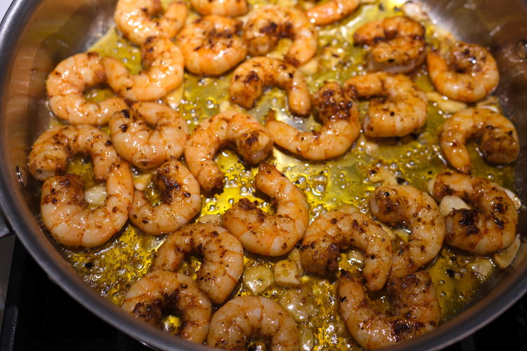 Image of Flip the shrimp individually after 1 to 2 minutes. This...