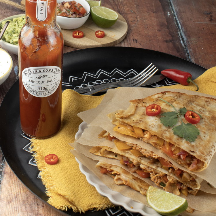 Image of Cut each quesadilla in half and serve as triangle wedges...