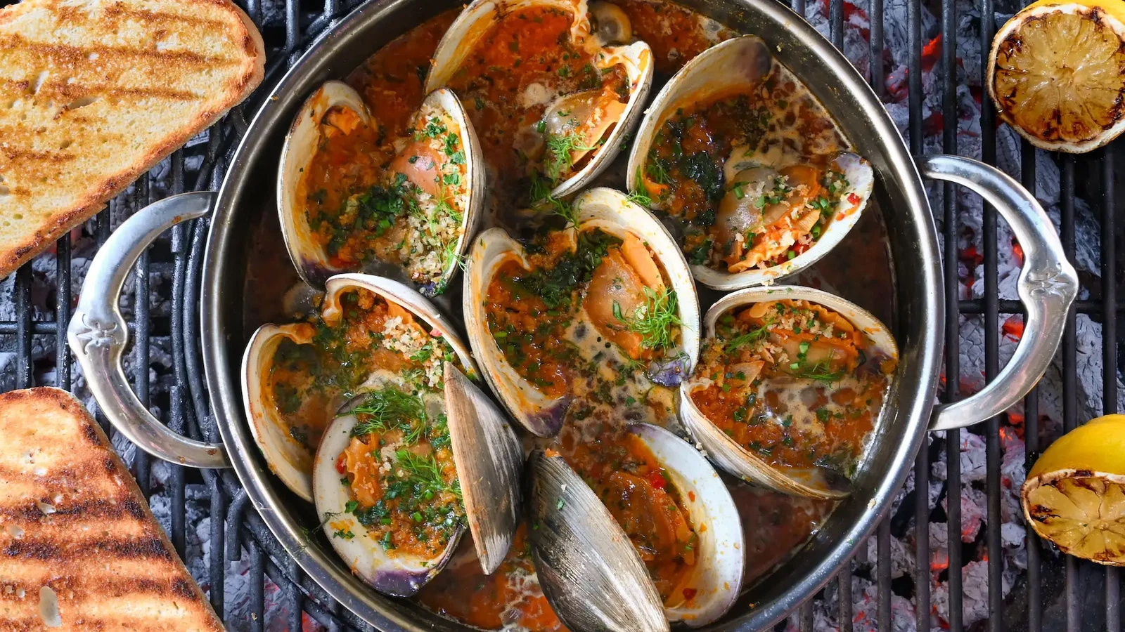 Image of Grilled Clams Casino with Calabrian Chili Sauce