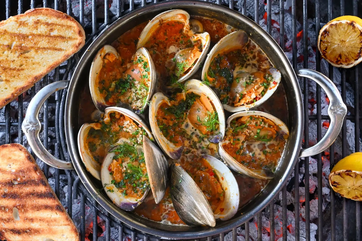 Grilled Clams Casino with Calabrian Chili Sauce