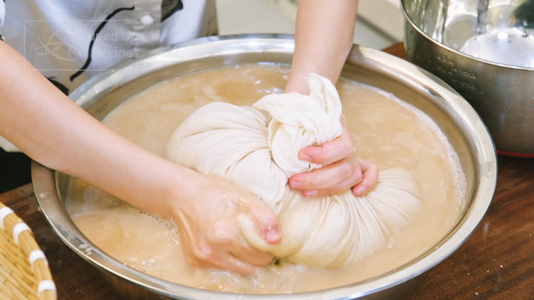 Image of Lift the cheesecloth and rub the puree continuously for 5–8...