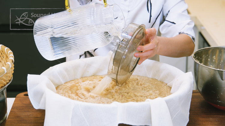 Image of Transfer the puree into a large container lined with a...