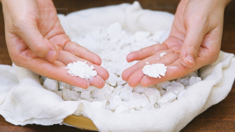 Image of As it dries, break it into chunks to speed up...