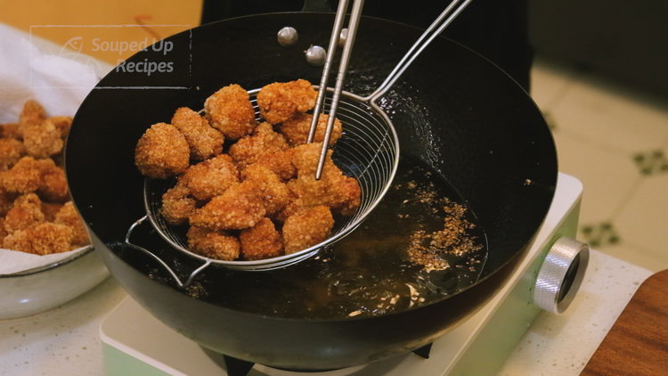 Image of Add the oil to a wok heat to 350 F....
