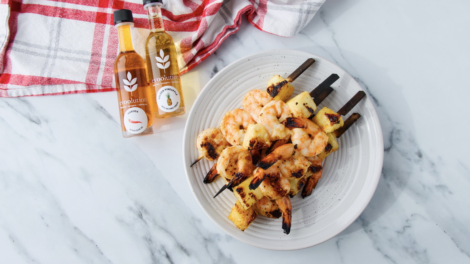 Image of Spicy Shrimp Skewers with Harissa Olive Oil and Golden Pineapple Balsamic