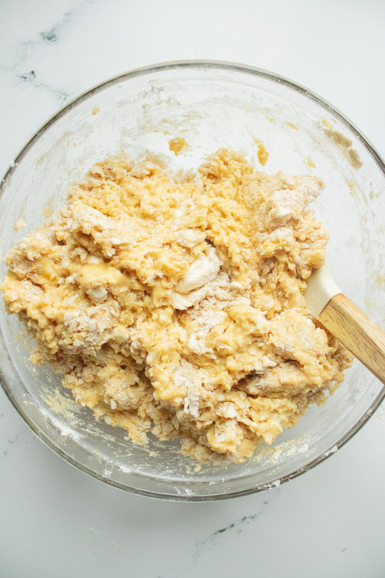 Image of Add into the liquid mixture. Mix until just combined.