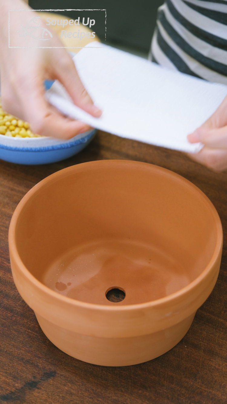 Image of Prepare a planter or colander with drainage holes. If the...