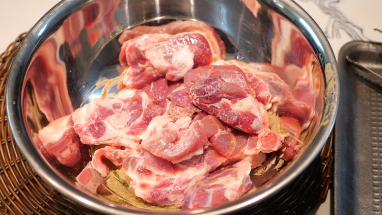 Image of Massage the marinade thoroughly into the lamb shoulder chops until...