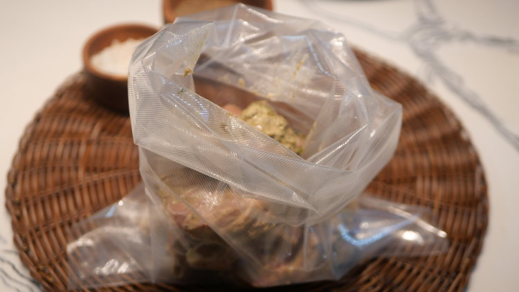 Image of Transfer the lamb into a vacuum-seal bag and seal tightly....