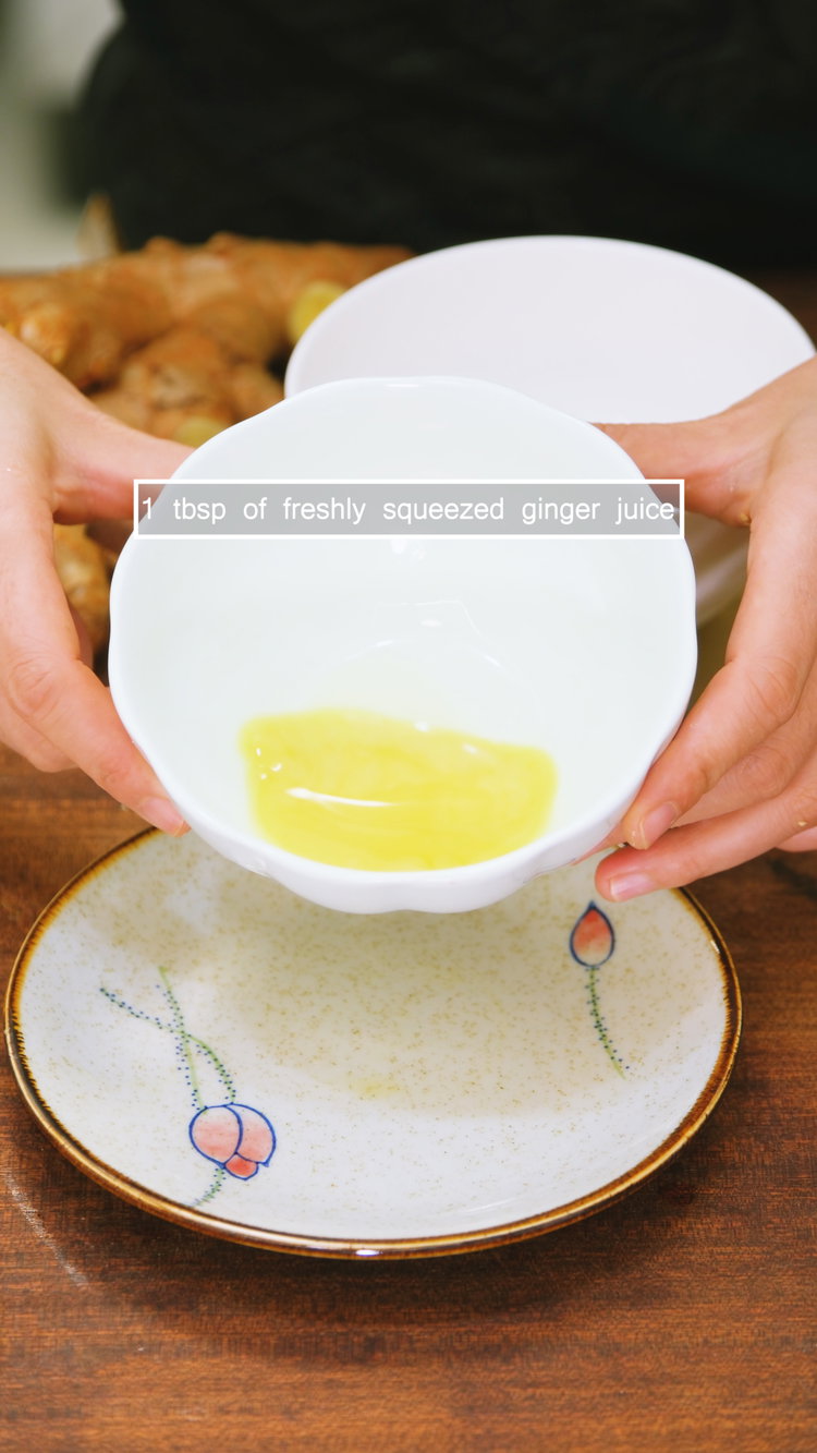 Image of Grating 1.5 inch of fresh ginger using a ceramic grater....