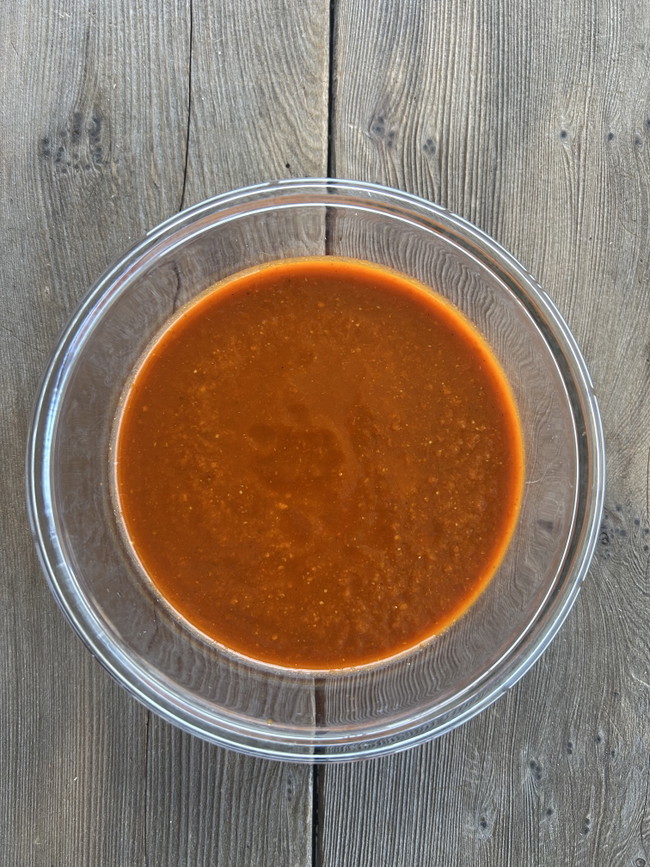 bowl of red enchilada sauce