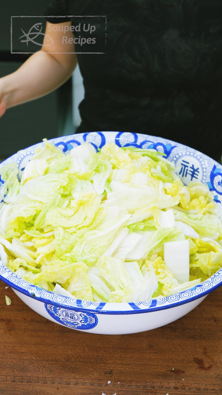 Image of Season the cabbage with 1/2 cup of salt and mix...