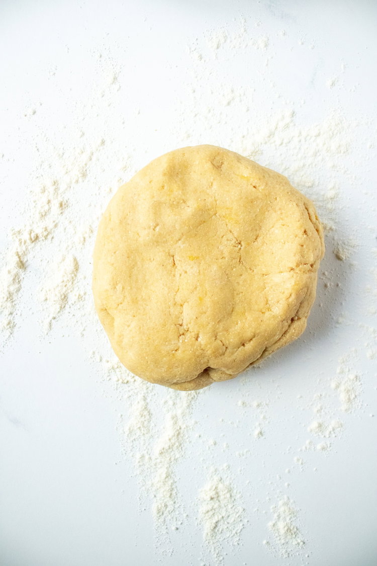 Image of Add in egg. Mix together until you can pinch dough...