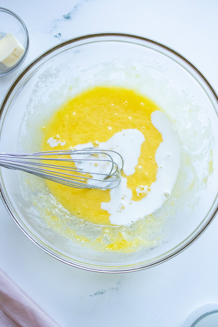 Image of Mix together the eggs and sugar, add in the butter...