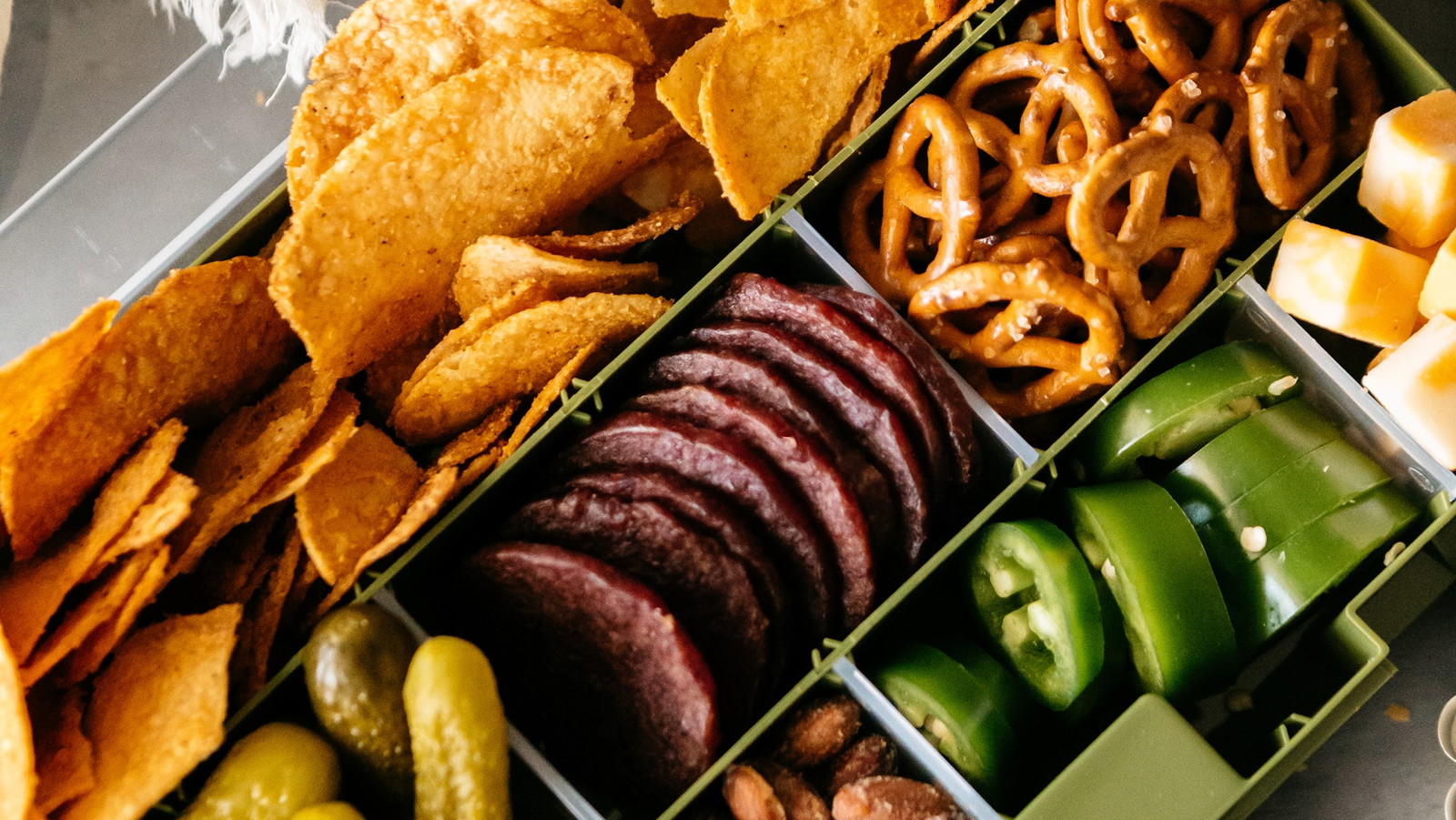 This ultimate Father's Day grazing board combines smoky beef jerky, sharp cheeses, and fresh jalapeños with a generous pile of Vandy Smokehouse BBQ.
