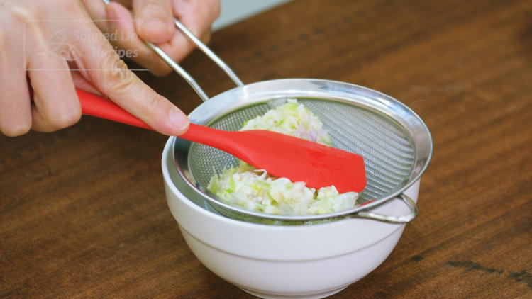 Image of To make the aromatic starch water, blend garlic, ginger, scallion...