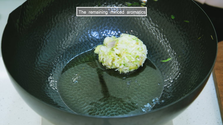 Image of In the same wok, add oil and the reserved chopped...