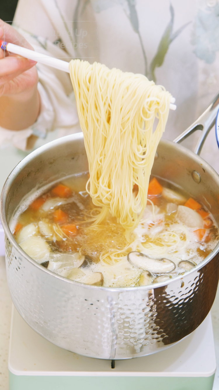 Image of Season the broth with soy sauce and salt to taste,...